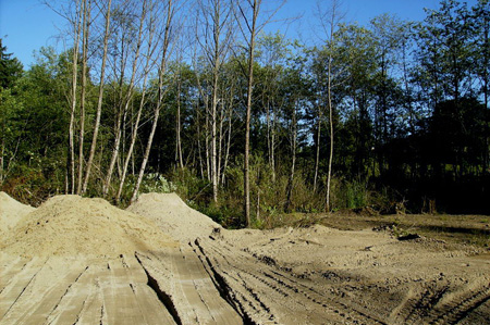 Road work involves installing proper drainage